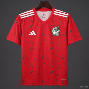 2026 Mexico Red Soccer Jersey with Green Geometric Triangles and Stripe